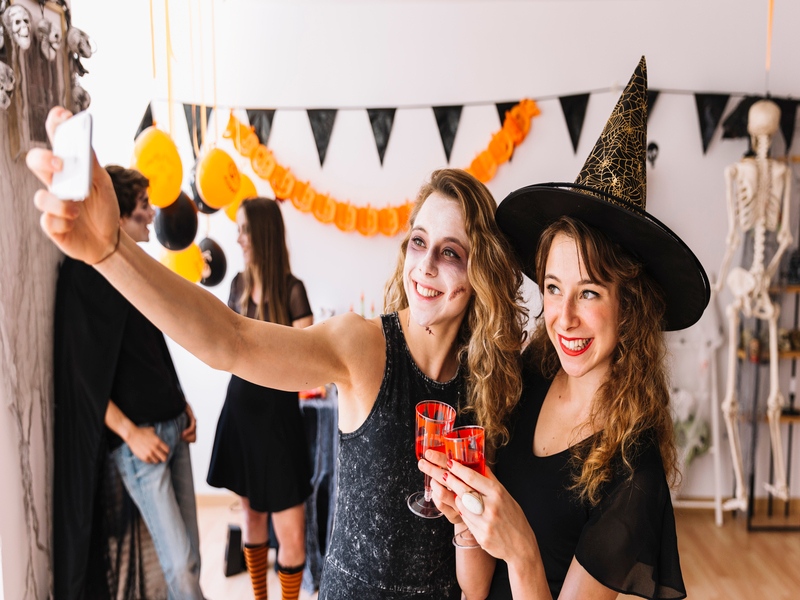 women-use-free-phone-take-photo-halloween